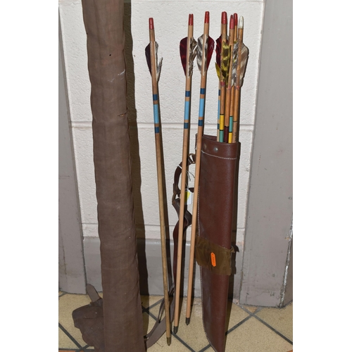 487 - A SET OF JAQUES ARCHERY BOWS AND ARROWS, comprising a 20lb 5ft bow,  an 18lbs 5ft bow in a canvas ba... 