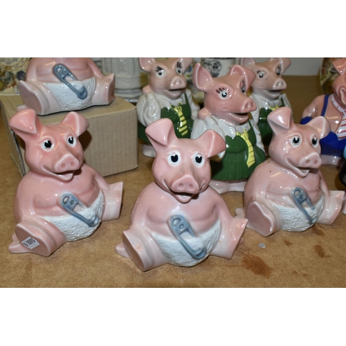 499 - NINE WADE NAT WEST PIGGY BANKS, comprising four x Woody - one boxed, three x Annabel, Maxwell and La... 