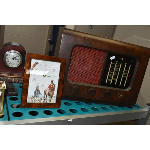 530 - A COLLECTION OF CLOCKS AND A 1930'S VALVE RADIO, comprising a wooden cased Pye radio serial number 2... 