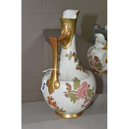 536 - TWO ROYAL WORCESTER IVORY GROUND EWERS, both printed and painted with sprays of flowers, the taller ... 