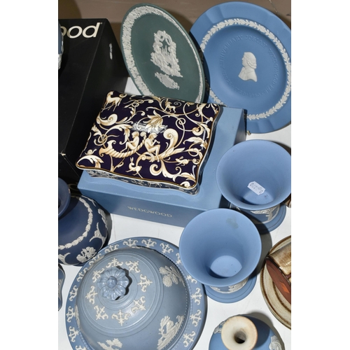 543 - A QUANTITY OF WEDGWOOD BLUE JASPERWARE, comprising a Ronson table lighter, a boxed fruit bowl, a bic... 