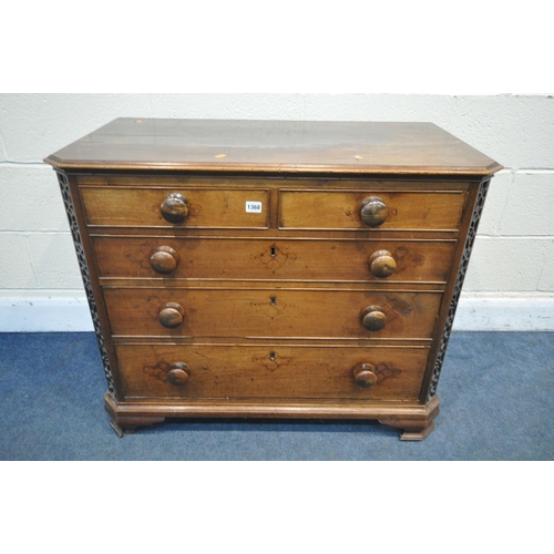 1195 - A GEORGIAN WALNUT CHEST OF TWO SHORT OVER THREE LONG GRADUATED DRAWERS, the canted front corners wit... 