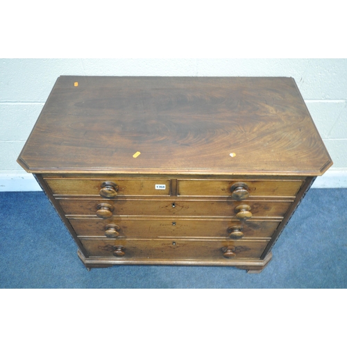 1195 - A GEORGIAN WALNUT CHEST OF TWO SHORT OVER THREE LONG GRADUATED DRAWERS, the canted front corners wit... 