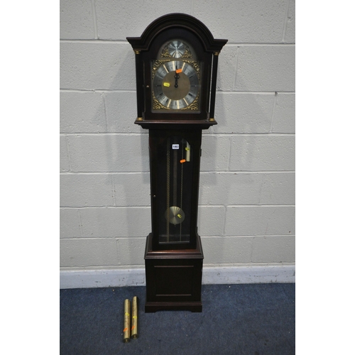 1199 - A MODERN MAHOGANY GRANDDAUGHTER CLOCK, the brass dial with a tempus fugit to arch and Roman numerals... 