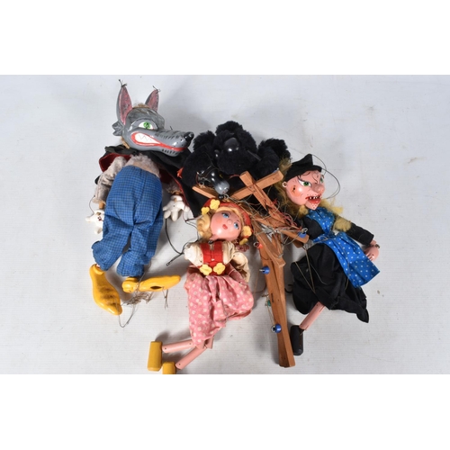 11 - FOUR UNBOXED PELHAM PUPPETS, SL63 Big Bad Wolf, SM Witch, SS Tyrolean Girl and LA Black Poodle, Wolf... 