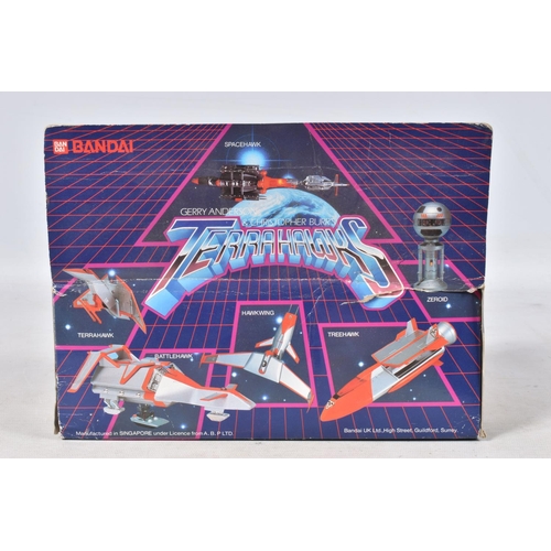 18 - A BOXED BANDAI TERRAHAWKS TREEHAWK ACTION MODEL, No.0988703, model still attached to box base, with ... 