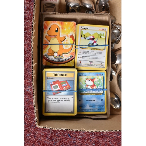 28 - A QUANTITY OF POKEMON CARDS AND CHILDRENS ANNUALS ETC., Pokémon cards are mainly Base Set cards but ... 