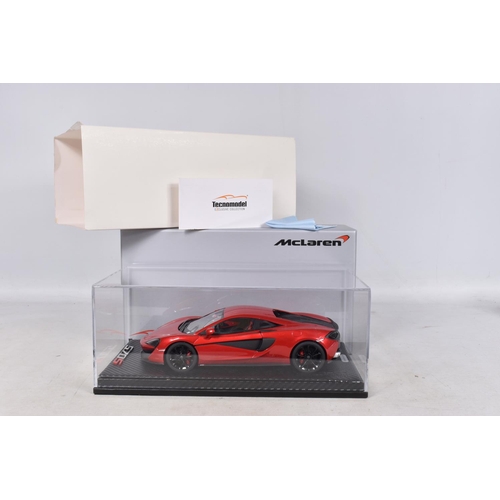 40 - A BOXED TECNOMODEL EXCLUSIVE COLLECTION MCLAREN 570S 1:18 MODEL VEHICLE, numbered T18-EX02C, in Verm... 