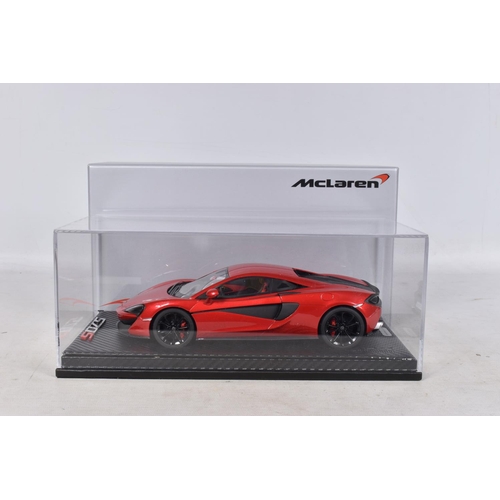 40 - A BOXED TECNOMODEL EXCLUSIVE COLLECTION MCLAREN 570S 1:18 MODEL VEHICLE, numbered T18-EX02C, in Verm... 