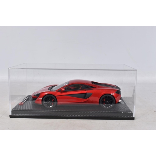 40 - A BOXED TECNOMODEL EXCLUSIVE COLLECTION MCLAREN 570S 1:18 MODEL VEHICLE, numbered T18-EX02C, in Verm... 