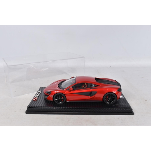 40 - A BOXED TECNOMODEL EXCLUSIVE COLLECTION MCLAREN 570S 1:18 MODEL VEHICLE, numbered T18-EX02C, in Verm... 