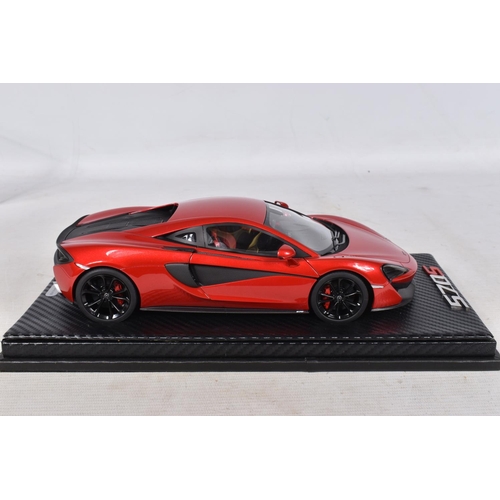 40 - A BOXED TECNOMODEL EXCLUSIVE COLLECTION MCLAREN 570S 1:18 MODEL VEHICLE, numbered T18-EX02C, in Verm... 