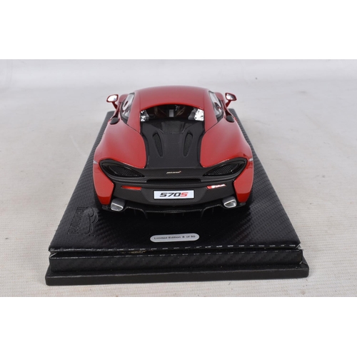 40 - A BOXED TECNOMODEL EXCLUSIVE COLLECTION MCLAREN 570S 1:18 MODEL VEHICLE, numbered T18-EX02C, in Verm... 