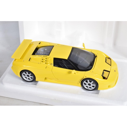 42 - A BOXED AUTOART BUGATTI EB110 SS 1:18 DIE-CAST MODEL VEHICLE, model number 70918, Giallo Bugatti yel... 