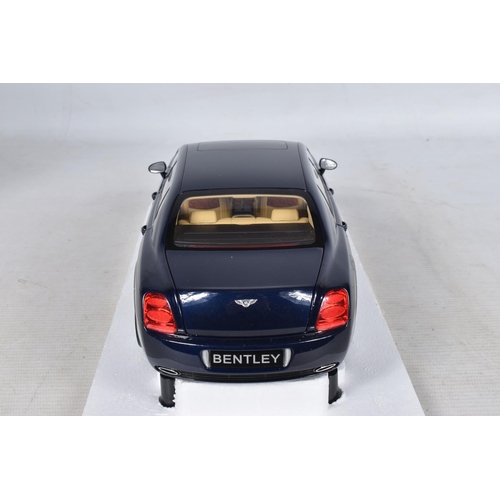 49 - A BOXED MINICHAMPS BENTLEY CONTINENTAL FLYING SPUR 2005 1:18 MODEL VEHICLE, numbered 100139460, mode... 