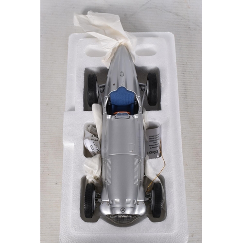 51 - A BOXED CMC SOLITAIR MODELL MERCEDES BENZ W154 1938 1:18 MODEL VEHICLE, numbered to the swing tag 42... 