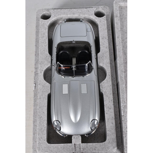 52 - A BOXED AUTOART SIGNATURE JAGUAR E-TYPE SERIES 1 ROADSTER 1:18 MODEL VEHICLE, numbered 73602, serial... 