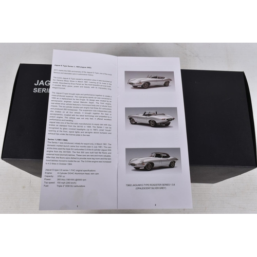 52 - A BOXED AUTOART SIGNATURE JAGUAR E-TYPE SERIES 1 ROADSTER 1:18 MODEL VEHICLE, numbered 73602, serial... 