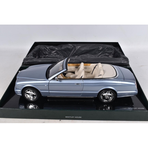 55 - A BOXED PAULS MODEL ART MINICHAMPS BENTLEY AZURE 1:18 MODEL VEHICLE, numbered BL472, pale blue in co... 