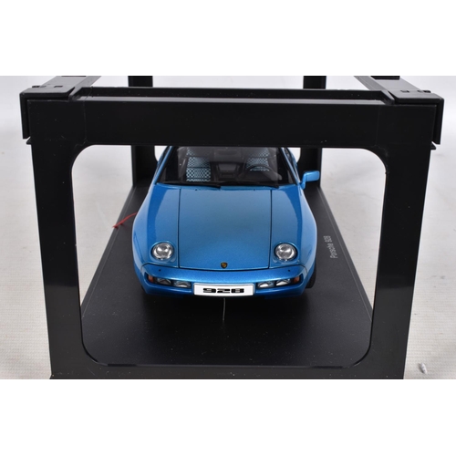 57 - A BOXED AUTOART MILLENNIUM PORSCHE 928 1:18 MODEL VEHICLE, numbered 77901, MINERVA BLUE METALIC in c... 