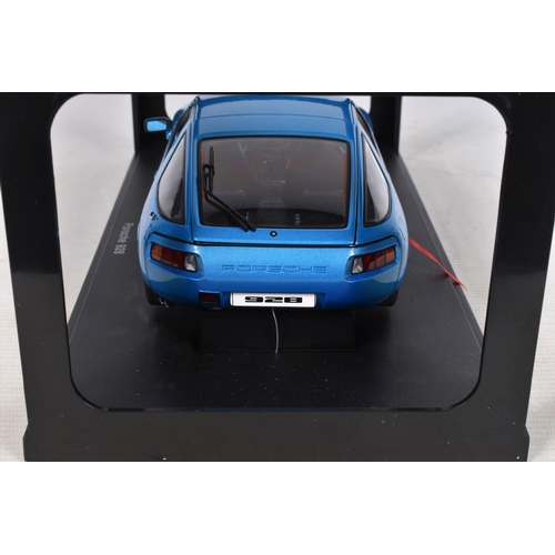 57 - A BOXED AUTOART MILLENNIUM PORSCHE 928 1:18 MODEL VEHICLE, numbered 77901, MINERVA BLUE METALIC in c... 