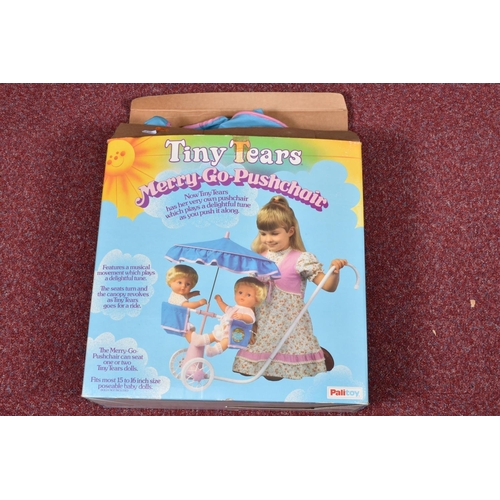 70 - A BOXED PALITOY TINY TEARS MERRY-GO-PUSHCHAIR, not assembled, appears complete but has some damage t... 