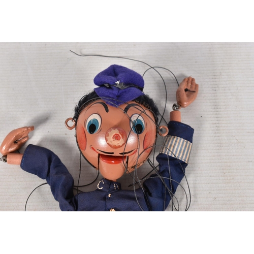 83 - SEVEN BOXED PELHAM POLICEMAN PUPPETS, three SS including one of the whistling versions and four SM, ... 