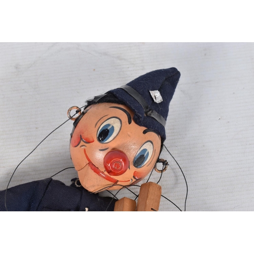 83 - SEVEN BOXED PELHAM POLICEMAN PUPPETS, three SS including one of the whistling versions and four SM, ... 