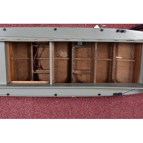 86 - A MOTORISED WOODEN KIT BUILT MILITARY LANDING CRAFT MODEL, told by client has been out on water, woo... 