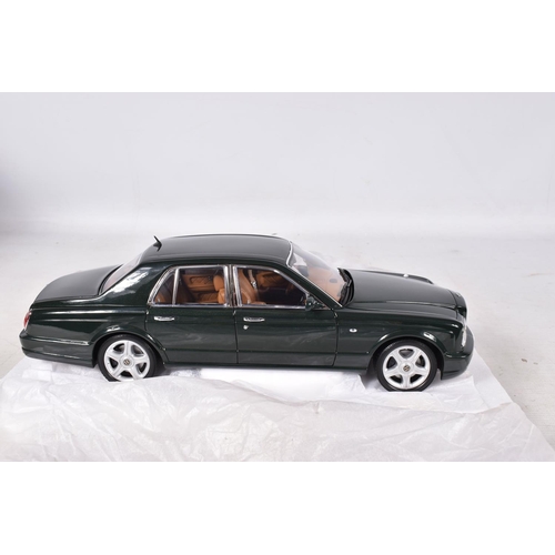 91 - A BOXED MINICHAMPS BENTLEY ARNAGE T 2002 1:18 MOCEL VEHICLE, numbered 100 139070, in metallic green,... 