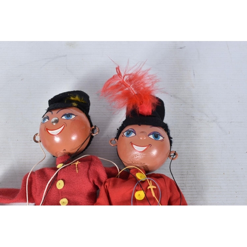 95 - SEVEN BOXED PELHAM SS MITZI AND FRITZI PUPPETS, four Fritzi and three Mitzi, one Fritzi with sword, ... 