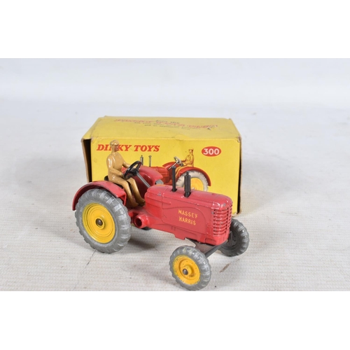 124 - A BOXED DINKY TOYS MASSEY-HARRIS TRACTOR DIE-CAST MODEL AND FOUR OTHER BOXED MODELS, numbered 300, r... 