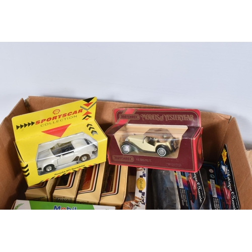 129 - THREE BOXES OF BOXED AND UNBOXED DIECAST VEHICLES, to include Lledo, Mobil, Shell, Matchbox and anti... 