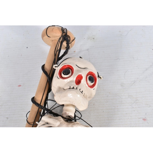 137 - A BOXED PELHAM WONKY LULLABELLE PUPPET, with a boxed Pelham LS Skeleton puppet, both appear complete... 