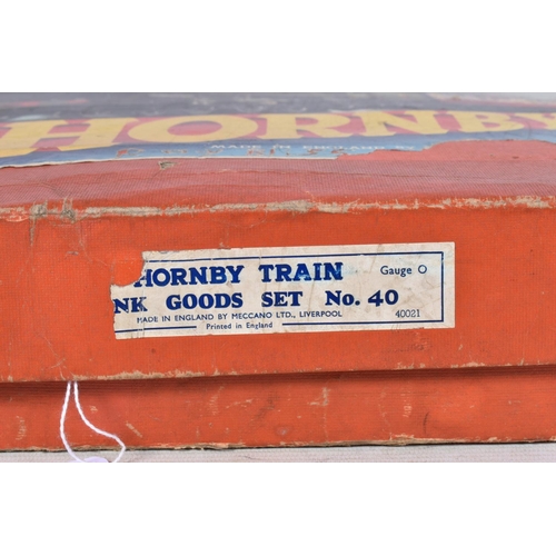 142 - A BOXED HORNBY TRAINS O GAUGE TANK GOODS SET, No.40, comprising 0-4-0 tank locomotive No.82011, B.R.... 