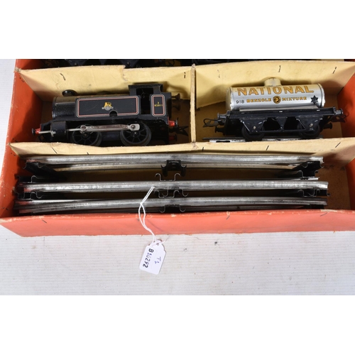 142 - A BOXED HORNBY TRAINS O GAUGE TANK GOODS SET, No.40, comprising 0-4-0 tank locomotive No.82011, B.R.... 