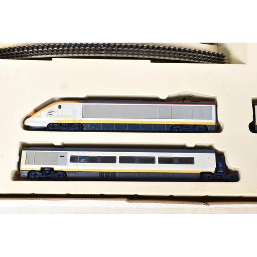 162 - A BOXED HORNBY RAILWAYS (JOUEF) HO GAUGE EUROSTAR TRAIN SET, No.R647, comprising power cars No's. 32... 