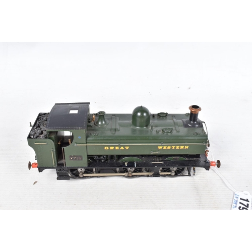 179 - A BOXED CONSTRUCTED KIT MODEL OF A CLASS 57XX PANNIER TANK LOCOMOTIVE, No.7715, G.W.R. green livery,... 