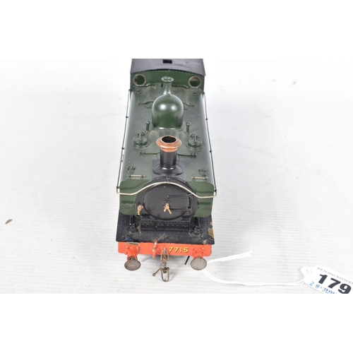 179 - A BOXED CONSTRUCTED KIT MODEL OF A CLASS 57XX PANNIER TANK LOCOMOTIVE, No.7715, G.W.R. green livery,... 