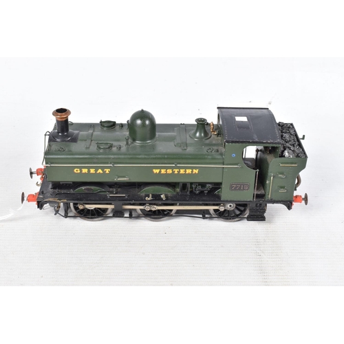 179 - A BOXED CONSTRUCTED KIT MODEL OF A CLASS 57XX PANNIER TANK LOCOMOTIVE, No.7715, G.W.R. green livery,... 