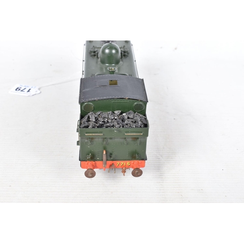 179 - A BOXED CONSTRUCTED KIT MODEL OF A CLASS 57XX PANNIER TANK LOCOMOTIVE, No.7715, G.W.R. green livery,... 