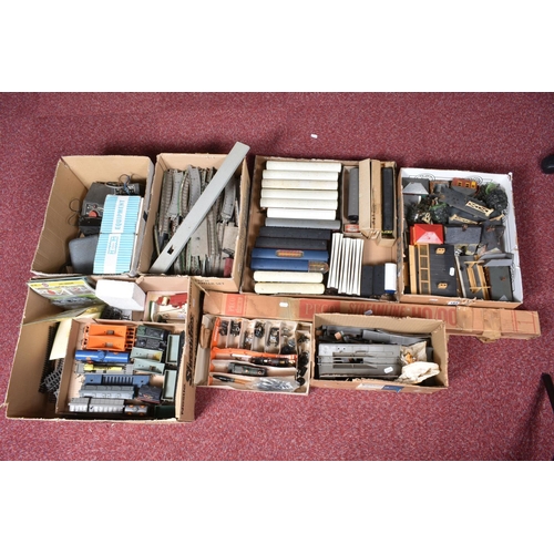 184 - A QUANTITY OF UNBOXED AND ASSORTED OO GAUGE MAINLY TRI-ANG MODEL RAILWAY ITEMS, to include assorted ... 