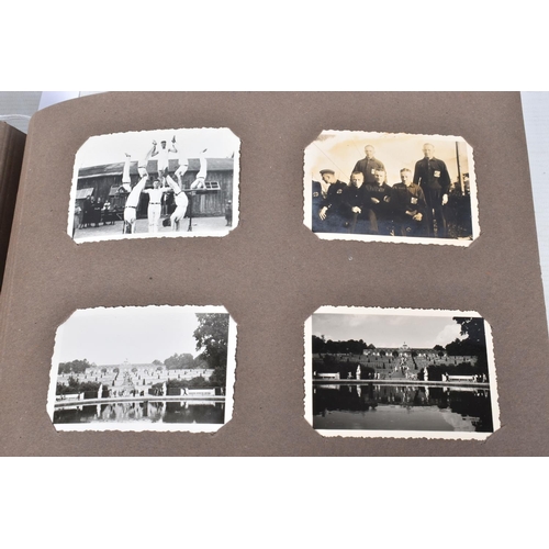 205 - A 1936 BERLIN OLYMPICS PHOTO ALBUM, this features 48 photos of various topics including street scene... 