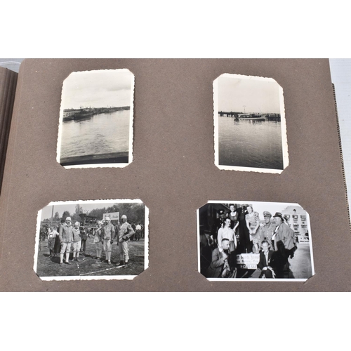 205 - A 1936 BERLIN OLYMPICS PHOTO ALBUM, this features 48 photos of various topics including street scene... 