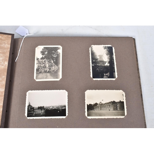 205 - A 1936 BERLIN OLYMPICS PHOTO ALBUM, this features 48 photos of various topics including street scene... 