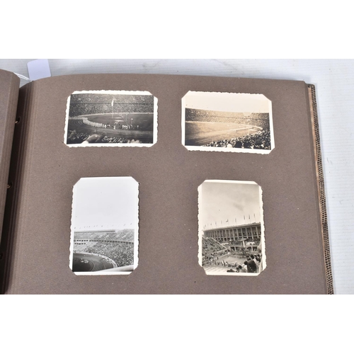 205 - A 1936 BERLIN OLYMPICS PHOTO ALBUM, this features 48 photos of various topics including street scene... 