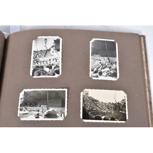 205 - A 1936 BERLIN OLYMPICS PHOTO ALBUM, this features 48 photos of various topics including street scene... 