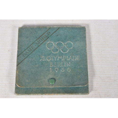 209 - A 1936 BERLIN OLYMPIC SOUVENIR TRAVEL CHEQUERS/DRAUGHTS GAME, also include is an empty photo album, ... 