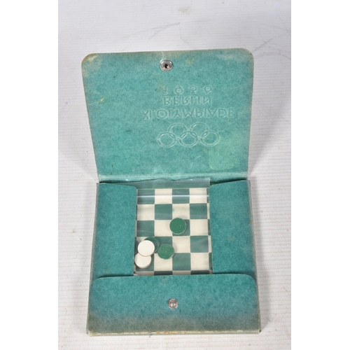 209 - A 1936 BERLIN OLYMPIC SOUVENIR TRAVEL CHEQUERS/DRAUGHTS GAME, also include is an empty photo album, ... 