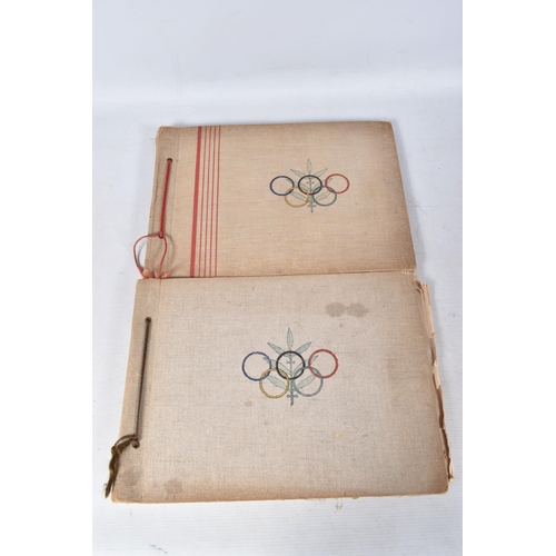 211 - TWO 1936 BERLIN OLYMPIC ALBUMS OF PHOTOGRAPHS, ticket stubs, stamped postcards, the first album cont... 